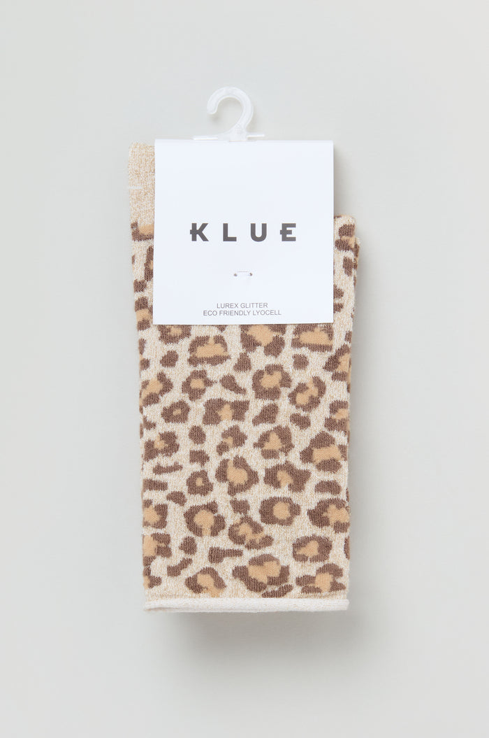 A pair of Bamboo Leopard Print Socks in beige with a brown pattern, packaged with a white "KLUE" label.