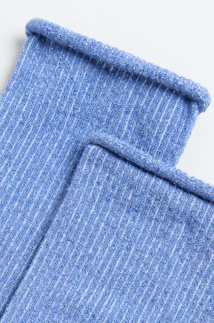 Close-up of two Bamboo Sparkle Blue Socks with ribbed knit cuffs, rolled edges, and a hint of metallic lurex, displayed side by side on a white background.