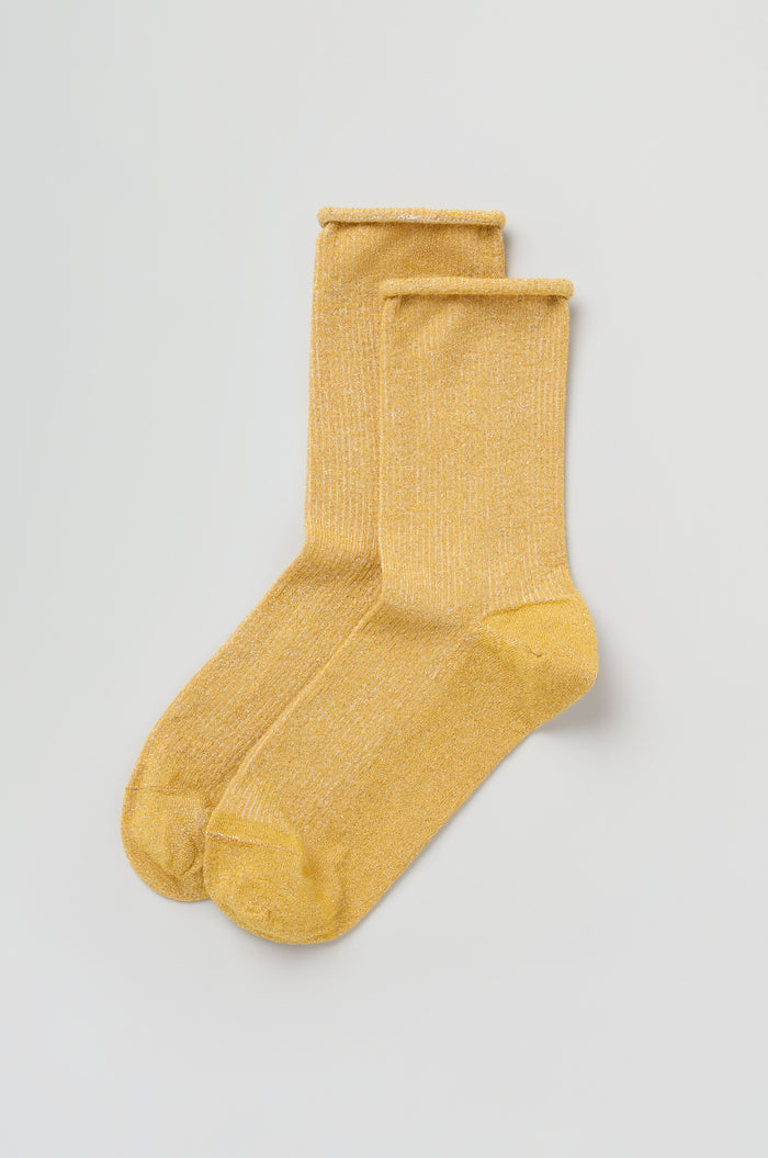 The Bamboo Sparkle Dijon Socks, featuring a yellow hue with a subtle shimmer, are displayed flat on a simple white background.