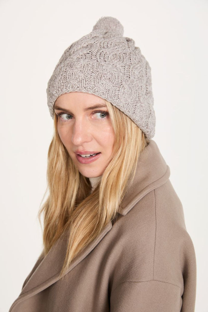Clifden Cable Aran Hat with Pom Poms -  Oat