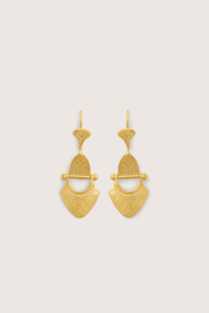 A pair of Engraved Gold Vermeil Tuareg Earrings displayed on a white background.