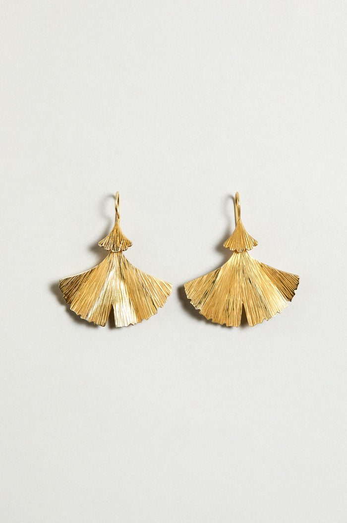 Gold Vermeil Ginkgo Leaf Earrings: gold-toned, fan-shaped earrings with a ribbed, textured surface, reminiscent of ginkgo leaves, shown on a plain light background.