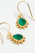 The Gold Vermeil Green Onyx Earrings feature teardrop-shaped green onyx stones, each encircled by a dainty beaded halo for an elegant touch.