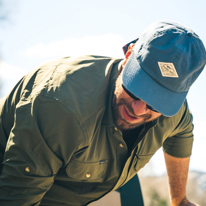 man wearing lake blue diamond patch hat