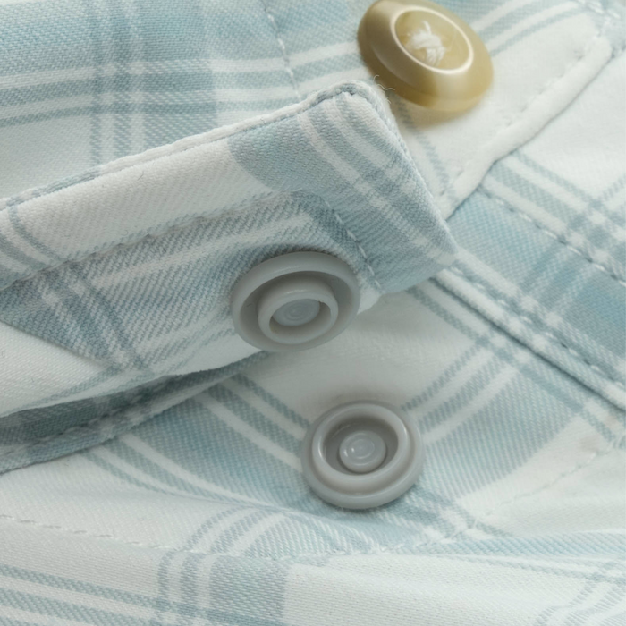Closeup of collar snaps on collar of shirt