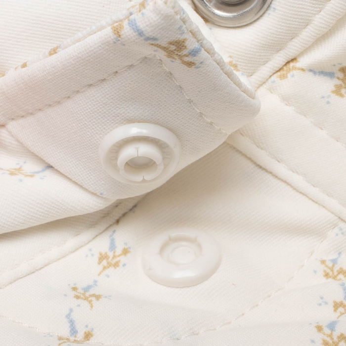 closeup of collar snaps on shirt