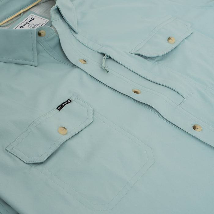 Light blue comfortable outdoor shirt close-up featuring The Antilles styling details