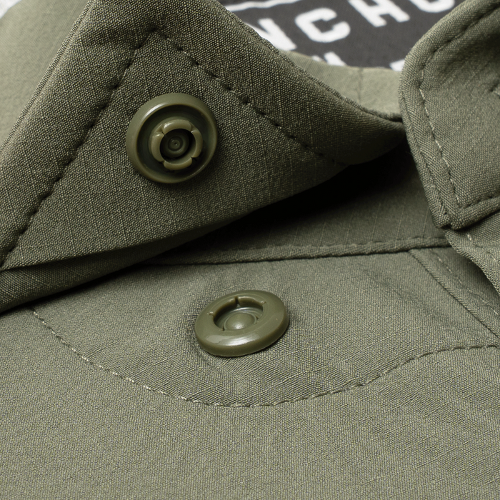 closeup of collar snaps on shirt