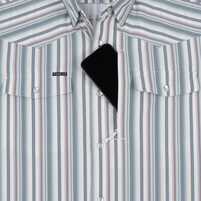 Phone in chest zipper pocket of shirt