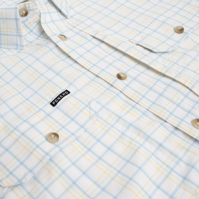 Close up of chest pockets on blue and yellow button down shirt