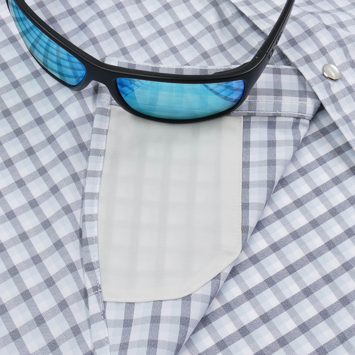The Blackfin shirt with a gray check pattern blue sunglasses and a white chest pocket