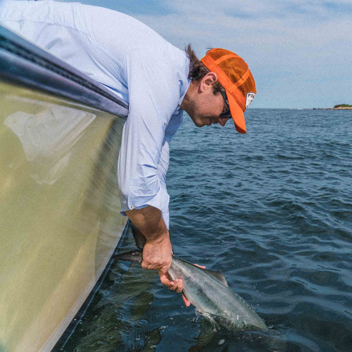 Long Sleeve microcheck shirt blue - man fishing
