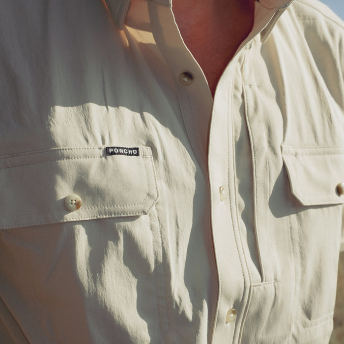 man wearing the brown bear shirt