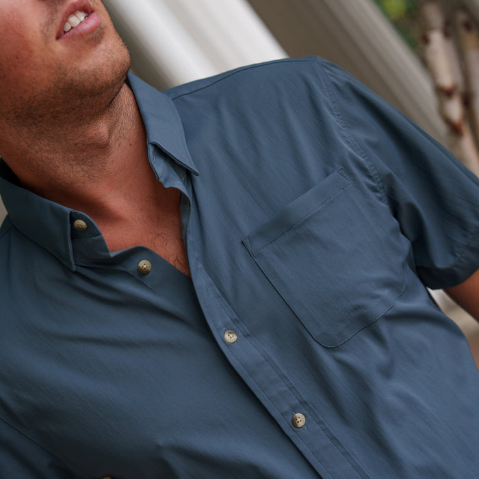 The Busted Prop blue button up shirt with short sleeves and chest pocket