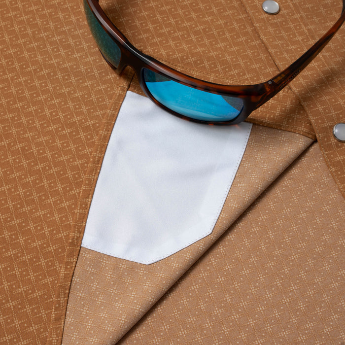 closeup of sunglasses with lens cleaner on shirt