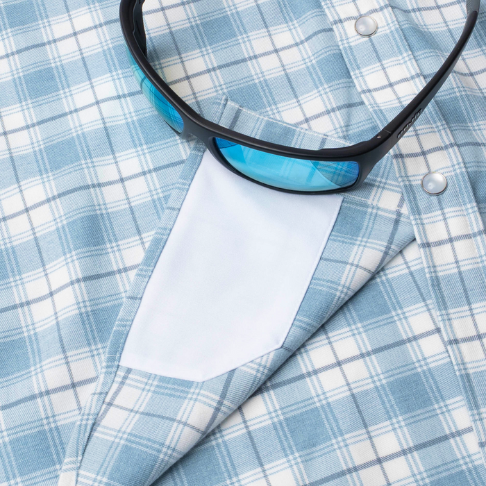 sunglasses with lens cleaner on shirt