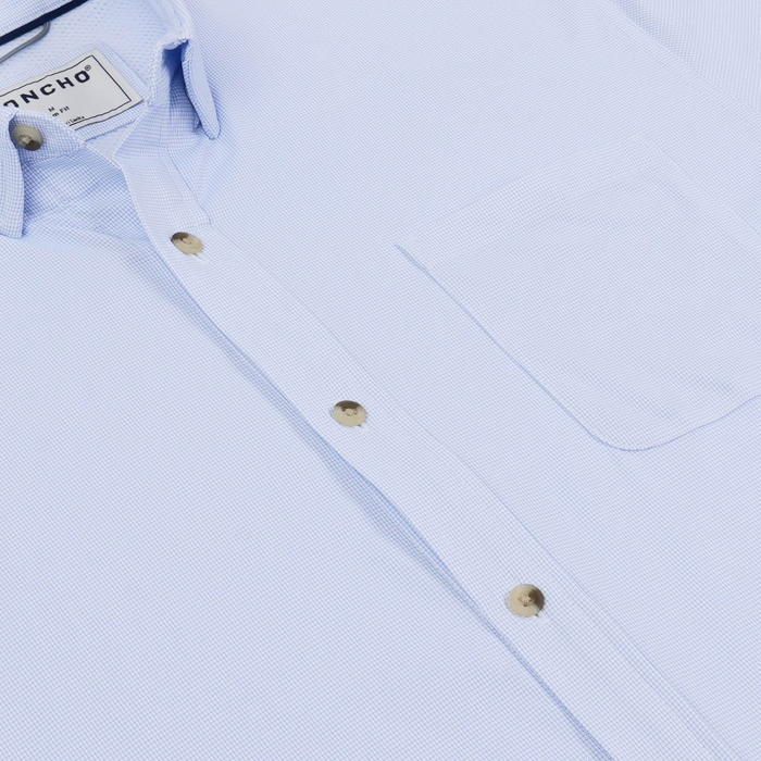 The Copano light blue button down shirt with chest pocket and textured fabric