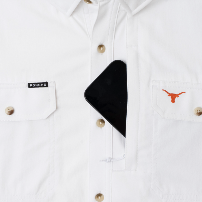 phone in chest zipper pocket of shirt