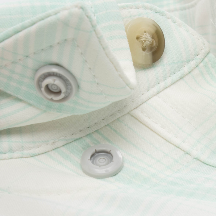 Closeup of collar snaps on collar of shirt