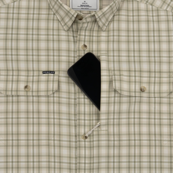 Phone in chest zipper pocket of shirt