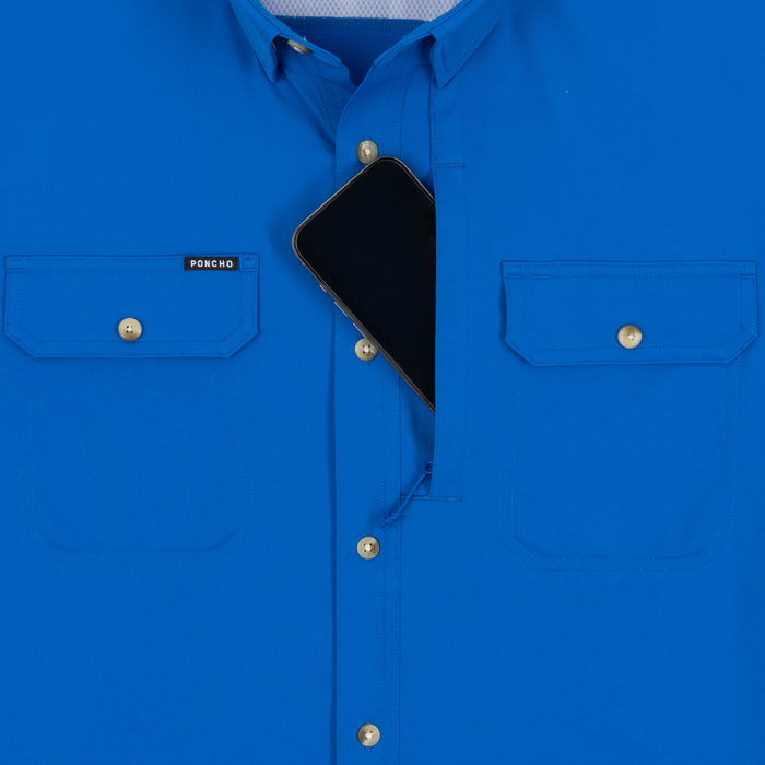 Phone in chest zipper pocket of shirt