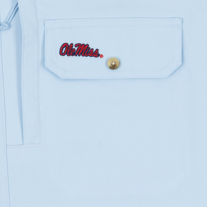 closeup of logo on pocket of shirt