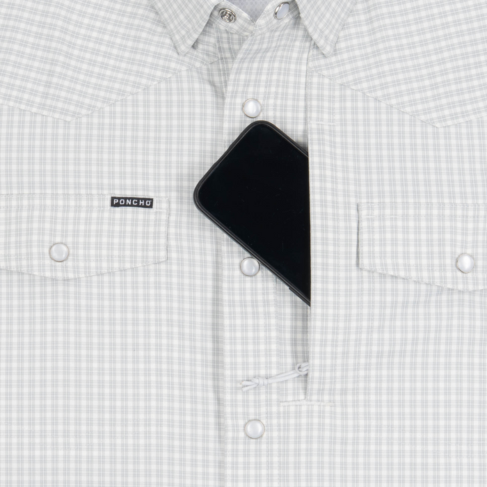 phone in chest zipper pocket of shirt