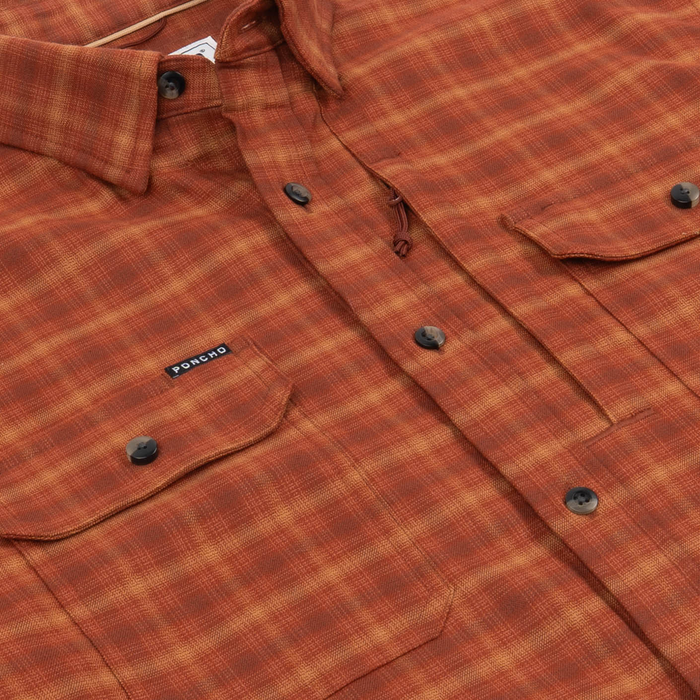 The Hot Sauce rust plaid shirt with button front chest pockets and rolled sleeve detail