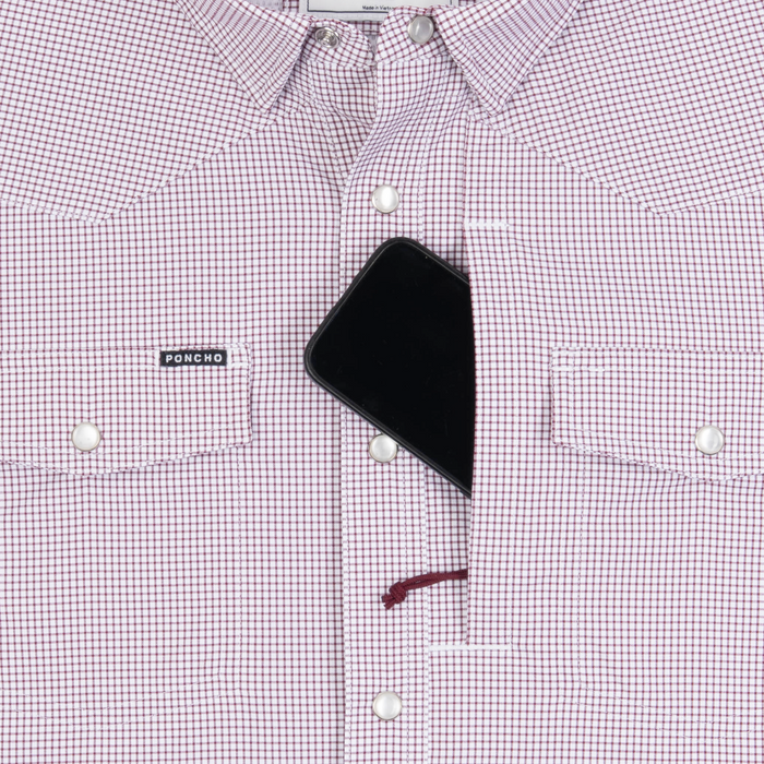 Phone in chest zipper pocket of shirt