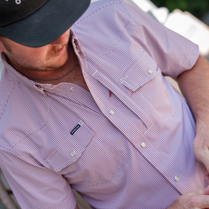 The Howdy maroon microcheck men's western pearl snap shirt with short sleeves and dual chest pockets