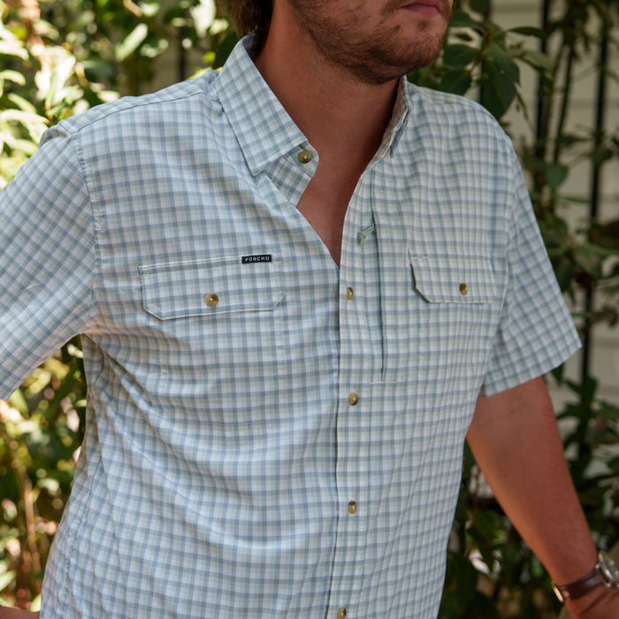 The Kahala light plaid short sleeve button down shirt worn outdoors