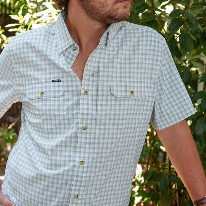 The Kahala light blue plaid short sleeve shirt worn outdoors