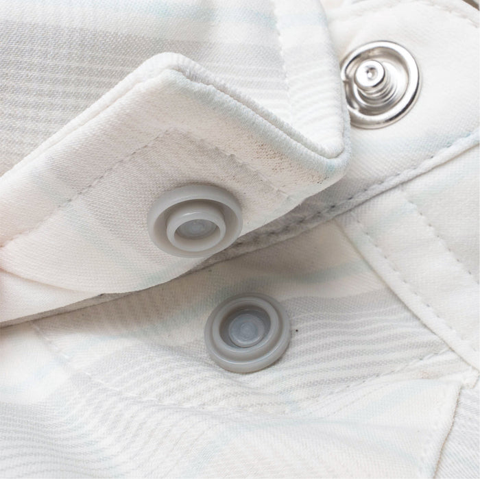 Closeup of collar snaps on collar of shirt