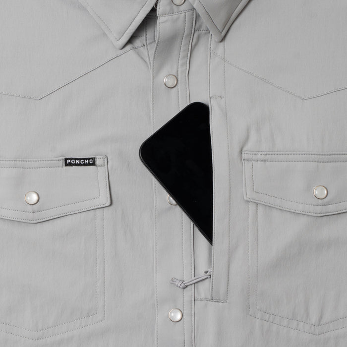 grey shirt with phone in zipper pocket