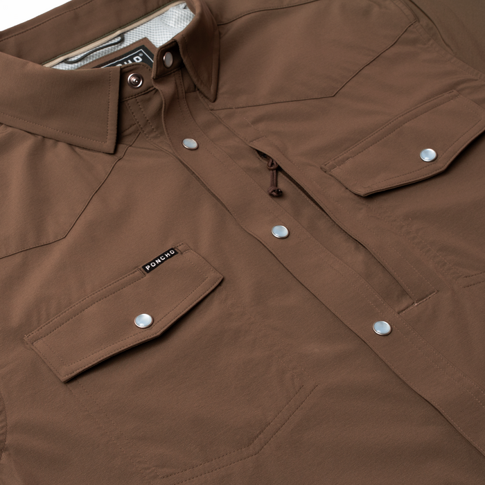 Close-up of The Lewis brown outdoor shirt with snap buttons and flap pockets
