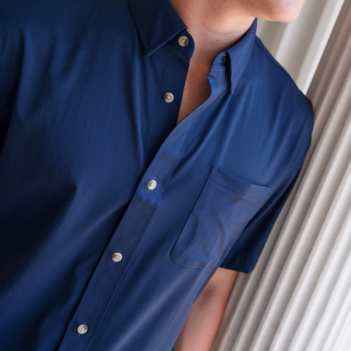 The Listo blue short sleeve button shirt with a front chest pocket