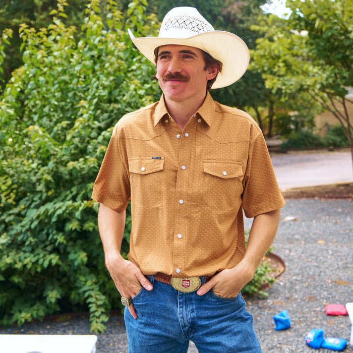 man with cowboy had wearing clyde short sleeve pearl snap shirt