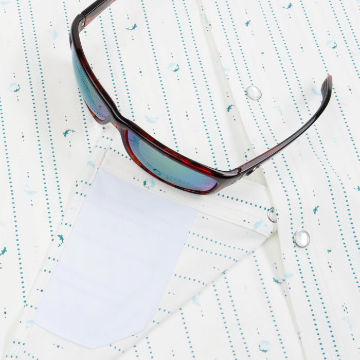Closeup of sunglasses with lens cleaner on shirt