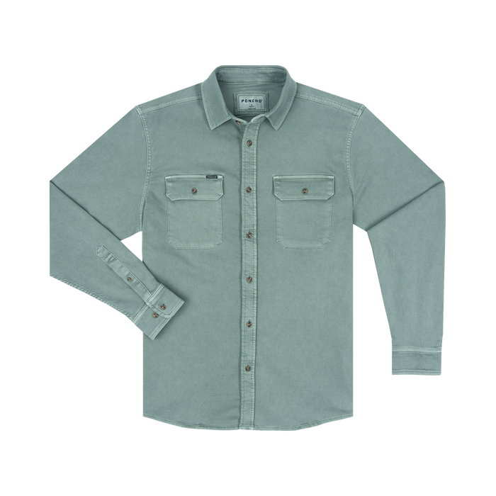 The Mentone long-sleeve shirt in muted green with button closures and dual chest pockets for outdoors use