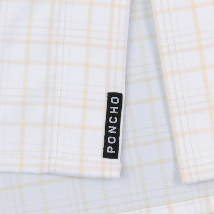 The Pascagoula white plaid shirt detail with Poncho label