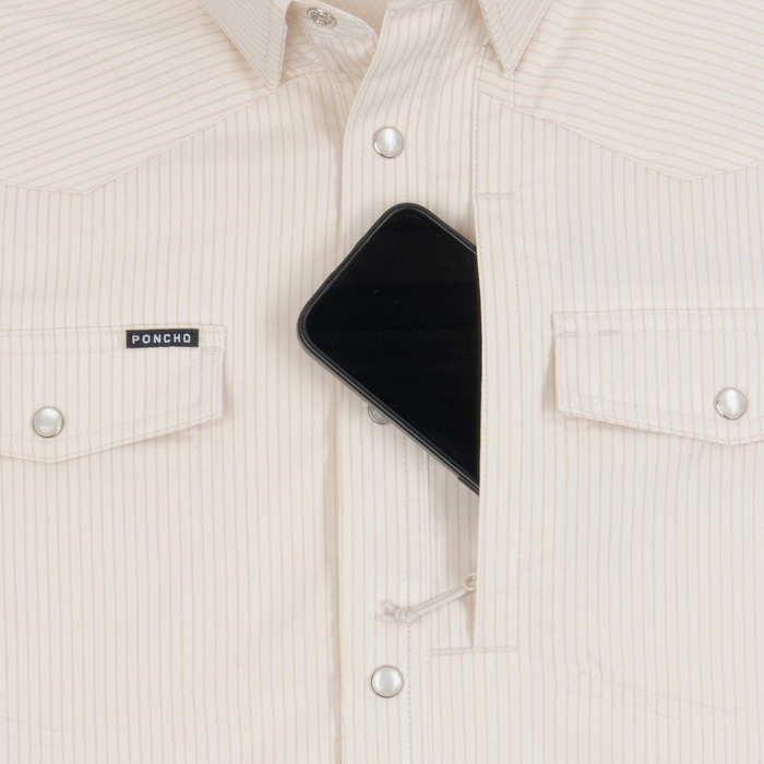 phone in chest zipper pocket of shirt