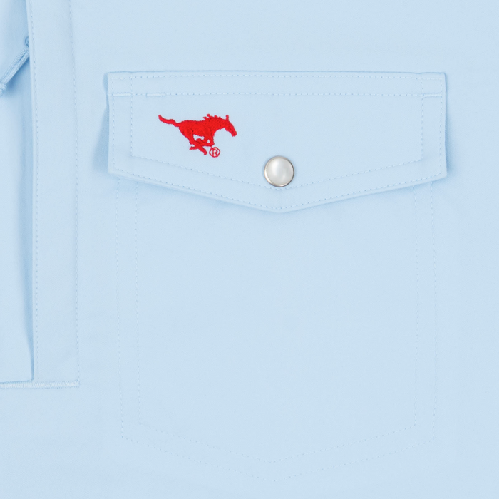 closeup of logo on pocket of shirt