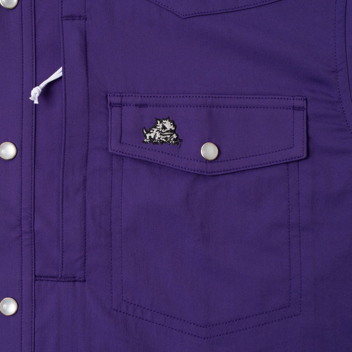 closeup of the TCU logo on pocket of shirt