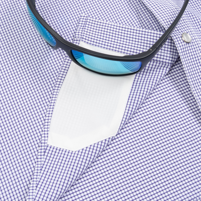 sunglasses with lens cleaner on shirt
