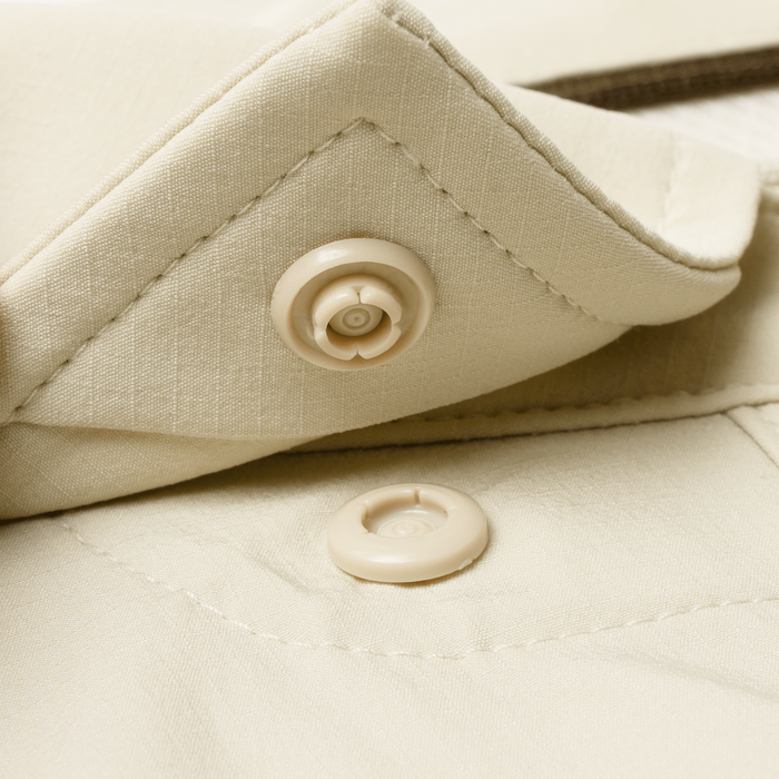 Closeup of collar snaps on collar of shirt