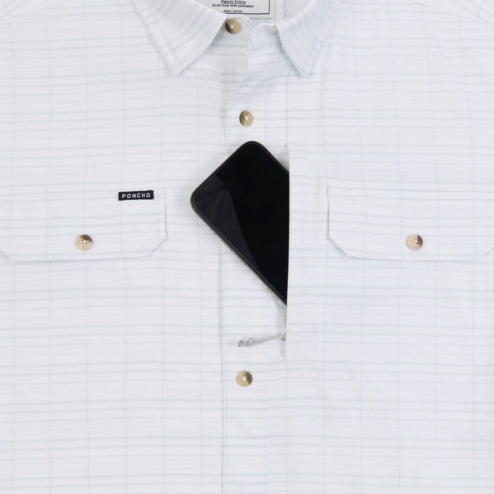 phone in chest zipper pocket of shirt