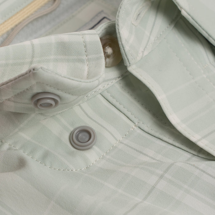 Hidden snap collar on green plaid button down shirt