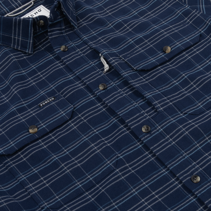 The Sturgeon navy plaid button-up shirt with chest pockets and Poncho label