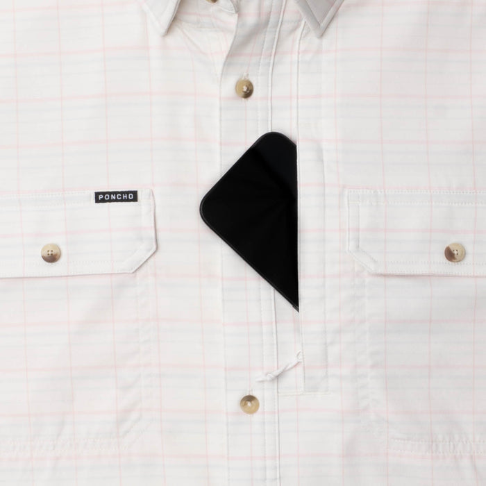 Phone in chest zipper pocket of shirt
