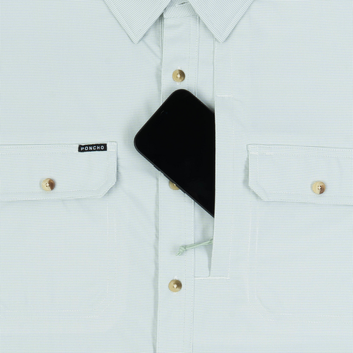 phone in chest zipper pocket of shirt